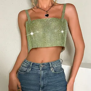 Detailed view of a sexy green rhinestone fishnet crop top with a sparkling texture