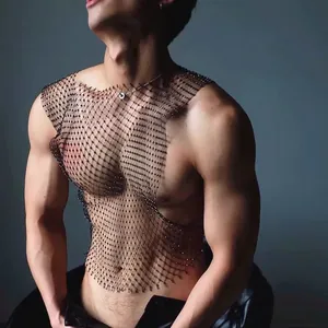 Close-up of sexy men's black fishnet tank top with sparkling crystal details on mesh