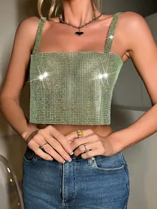 Close-up detail showing the texture of a lime green rhinestone mesh sexy crop top