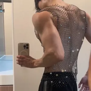 Close-up back view of men's sexy black fishnet tank top with sparkling rhinestones