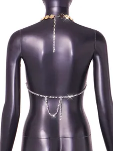 Sexy silver and gold body chain jewelry shown from the back on a black mannequin