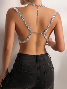 Detailed macro view of sparkling acrylic rhinestone chain top with backless design