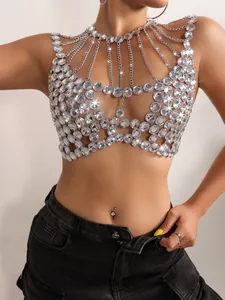 Close-up of a sexy silver rhinestone body chain top with layered chain straps.