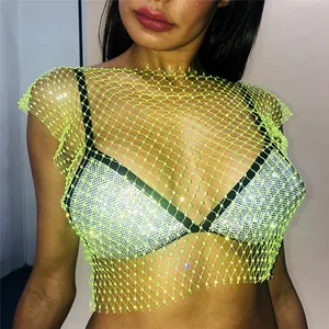 Close-up showing the sparkling rhinestone details on a neon green fishnet mesh party crop top