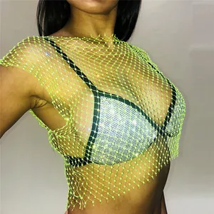 Close-up of neon green rhinestone fishnet tank top for sexy nightclub party wear