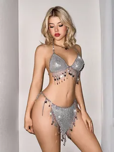 Sexy silver rhinestone body chain set with sparkling star fringe details on a model