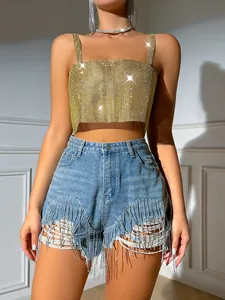 Detail view of a sexy gold mesh rhinestone camisole top for women's party wear.