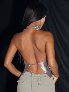 Back view detail of a sparkling silver metallic sequin halter top for clubwear