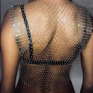 Close-up back view of a sparkling rhinestone mesh tank top ideal for sexy nightclub style