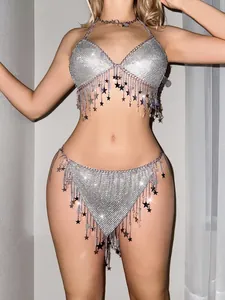 Detailed view of silver rhinestone star tassel body chain set with sparkling sequins.