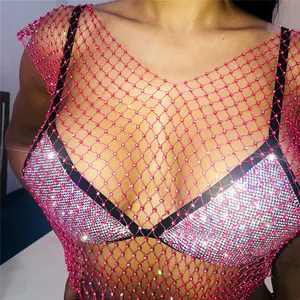Detail view of sexy pink fishnet tank top with sparkling rhinestones for clubwear fashion
