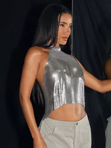 Detail of a sparkling silver metallic sequin halter top for party night clubwear