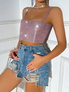 Sexy pink rhinestone camisole crop top and distressed denim shorts with fringe detail