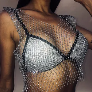 Close-up detail of silver rhinestone fishnet mesh top showing sparkly hollow out texture