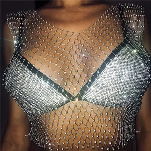 Detailed close-up of a shimmering rhinestone fishnet mesh top for party and nightclub outfits