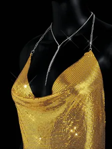 Detailed view of sexy gold metallic sequin halter top with deep V-neckline