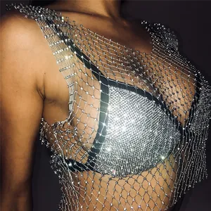 Close-up of sparkly rhinestone fishnet mesh crop top for sexy nightclub party wear