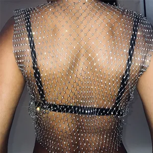 Close-up detail of sparkling rhinestone mesh top showing intricate crystal pattern