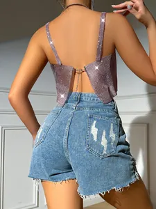 Close-up back detail of sexy pink rhinestone mesh camisole with metal chain strap.