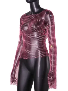 Detailed view of pink rhinestone fishnet top with sparkling crystals on black mannequin