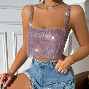 Close-up detail of sexy pink rhinestone fishnet camisole top featuring a square neckline