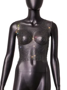 Detail of sparkly rhinestone fishnet tank top on a mannequin for nightclub style