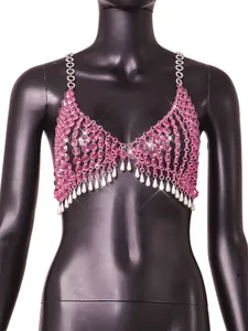 Detail of pink crystal beaded halter top with elegant pearl fringe accents