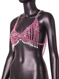 Detail shot of pink crystal beaded body chain top with hanging pearl droplets on mannequin