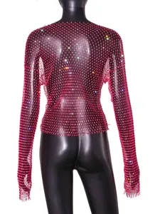 Detailed view of a sexy red rhinestone fishnet top with shimmering colorful crystals.