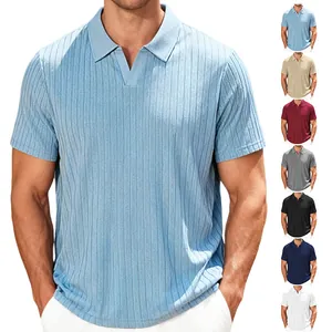 Close-up detail of vertical striped jacquard fabric on men's short-sleeve polo shirt