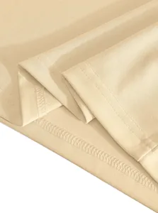 High-quality close-up detail of double stitching on a beige men's casual Polo shirt hem