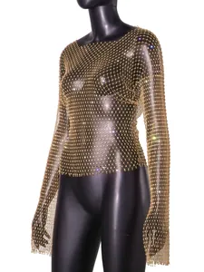 Detail view of a sexy gold fishnet top featuring sparkling rhinestone embellishments.