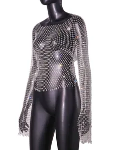 Detailed view of long-sleeve rhinestone mesh top with sparkling crystal fishnet pattern