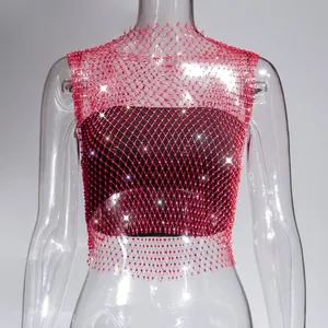 Detailed macro view of a sexy red fishnet mesh top decorated with sparkling rhinestones
