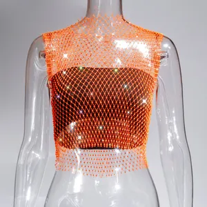 Detail view of a sexy orange rhinestone mesh fishnet tank top with sparkling finish