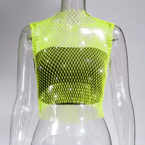 Close-up of sexy lime green fishnet top with sparkling rhinestones for nightclub wear