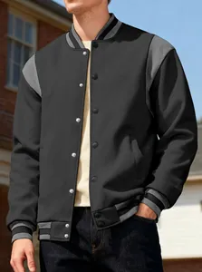Close-up of men's black and grey contrast varsity jacket with ribbed cuffs and collar