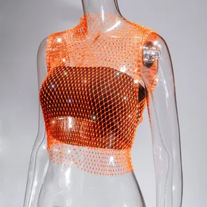Detailed view of a sexy orange fishnet vest top decorated with shiny rhinestones.