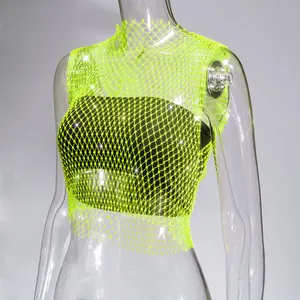 Close-up detail of neon green rhinestone fishnet crop top for sexy party clubwear