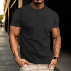 Close-up of men's quick-dry seersucker T-shirt featuring a waffle texture in dark grey.