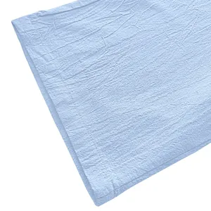 Macro detail of light blue breathable cotton linen fabric for men's casual pants