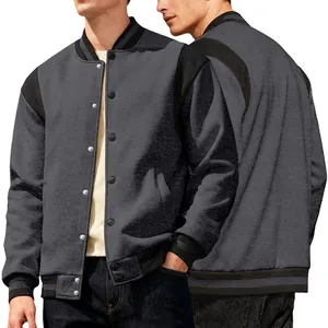 Detail view of grey and black color-block varsity jacket showing front and back features