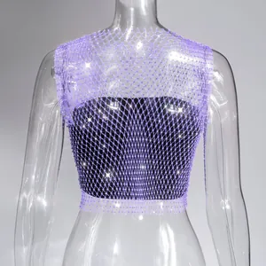 Detailed view of a shiny purple rhinestone mesh crop top for clubwear and parties