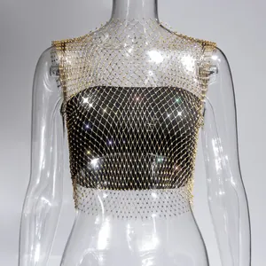 Close-up of gold sparkling rhinestone mesh top with diamond details on mannequin.