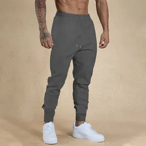 Professional slim fit men's dark grey joggers for gym, running, and casual fitness wear
