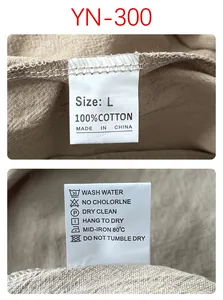 Makro-Detail des 100% reinen Baumwoll-Pflegeetiketts an der lässigen beigen Herrenjacke