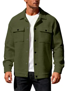 Detailed view of men's olive green waffle-knit jacket with button chest pockets