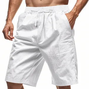 Detailed view of men's white breathable linen shorts with drawstring waist