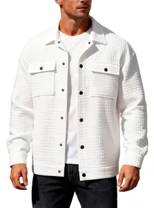 Detail view of men's white waffle knit jacquard jacket with chest pockets and buttons.