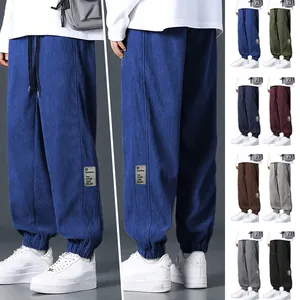 Loose fit men's corduroy casual pants displayed in various colors with side view details